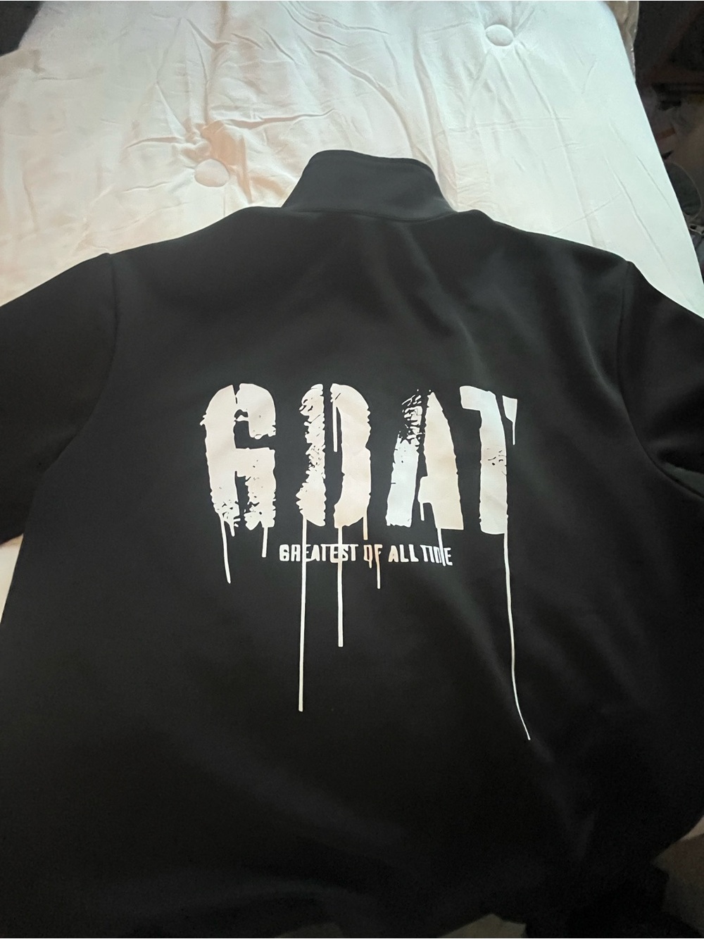 Black Zip-Up Jacket with White GOAT Graphic